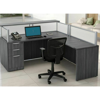 gray l-shaped reception desk with office supplies